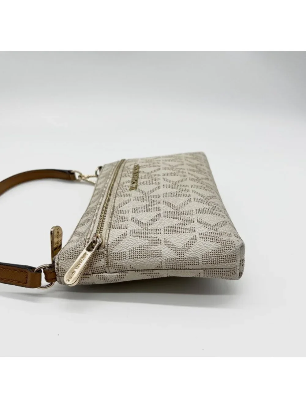 Michael Kors financial handles